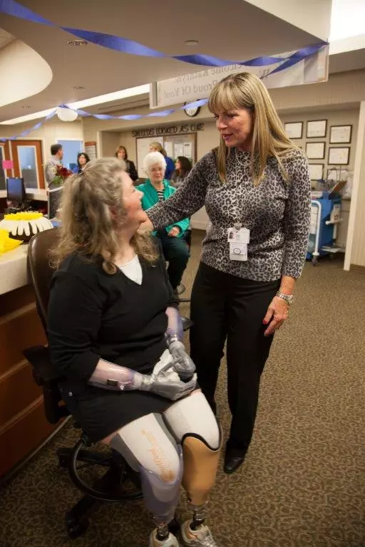 Jerri Garison, President of Baylor Regional Medical Center at Plano, greets Kuehn during her anniversary visit.