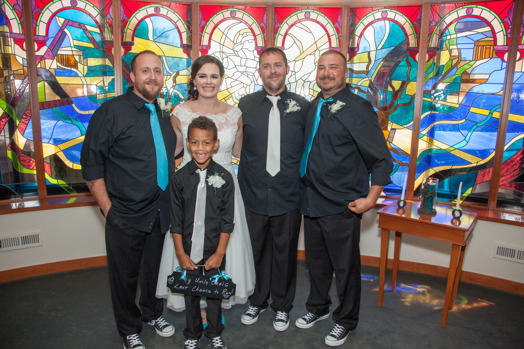 Bride and groom join groomsmen and ring bearer