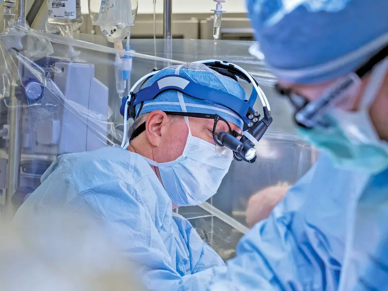 A cardiac surgeon in the operating room at our Dallas heart hospital.