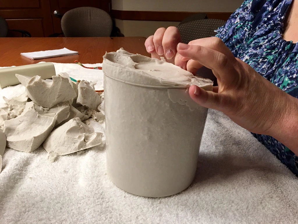 Trish removing the gel from clay molding.