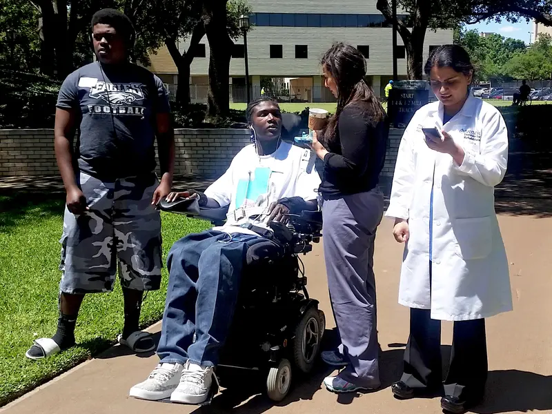 Walk and Roll with Walk With A Doc at Baylor Institute for Rehabilitation From left to right: Julius Fletcher, former Baylor Rehab patient, Evan Rainey, clinical research coordinator on staff at Baylor University Medical Center's Level I Trauma, Seema Sikka, MD, director of spinal cord injury research and quality at Baylor Rehab